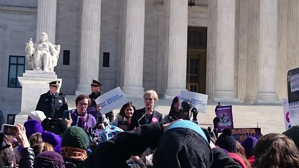 Cecile Richards, President of Planned Parenthood, speaks at a podium outside SCOTUS